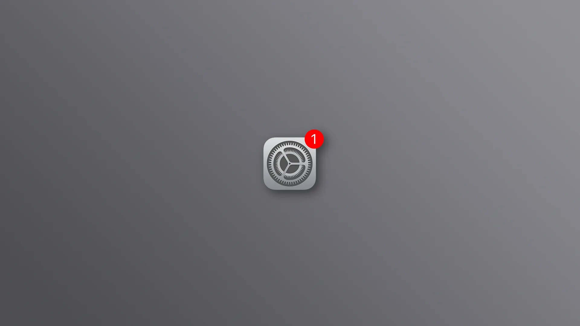 The iPhone's Settings icon with red badge, set against a gray background