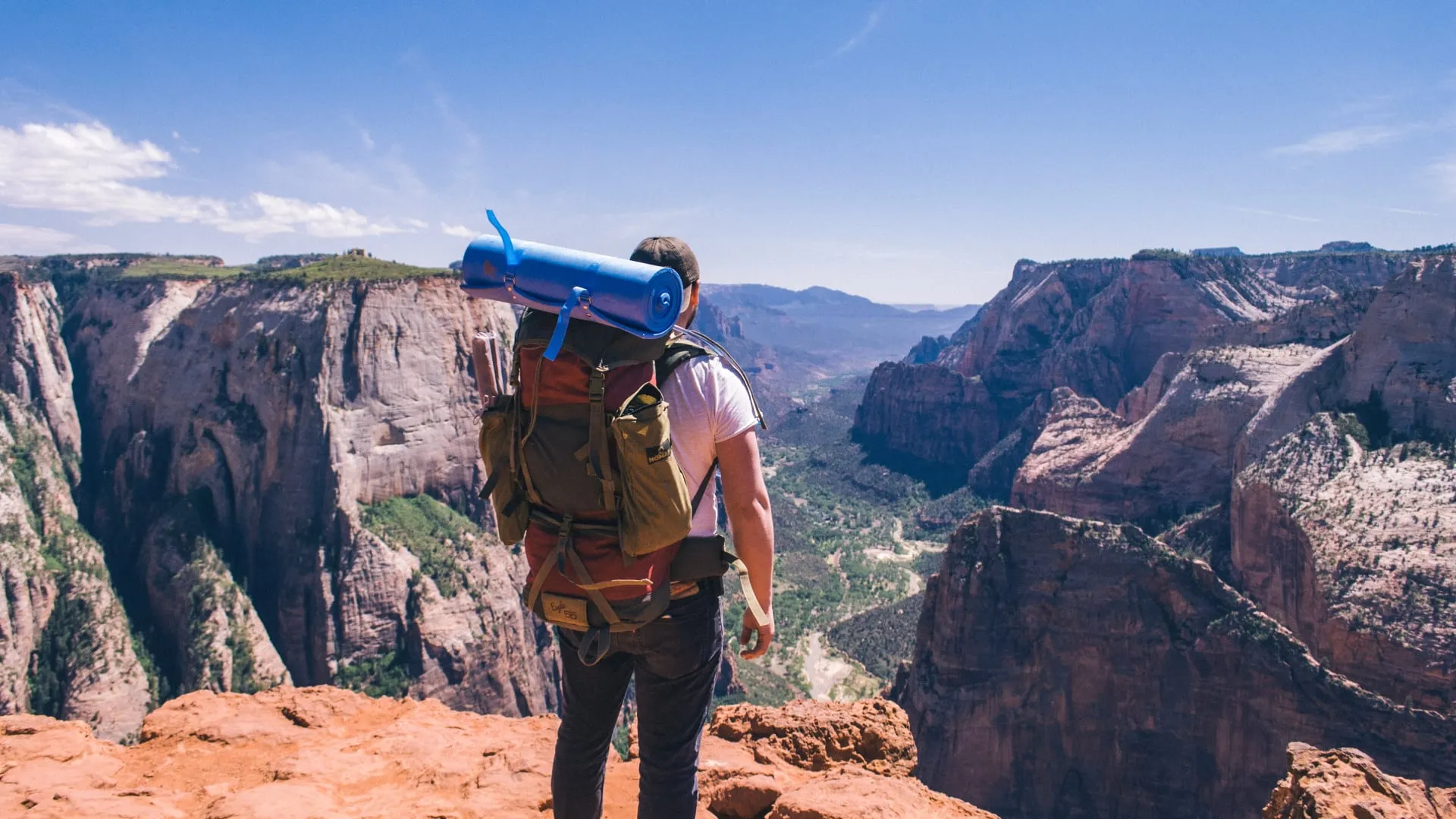 Backpacker overlooking Zion Canyon in Utah's Zion National Park