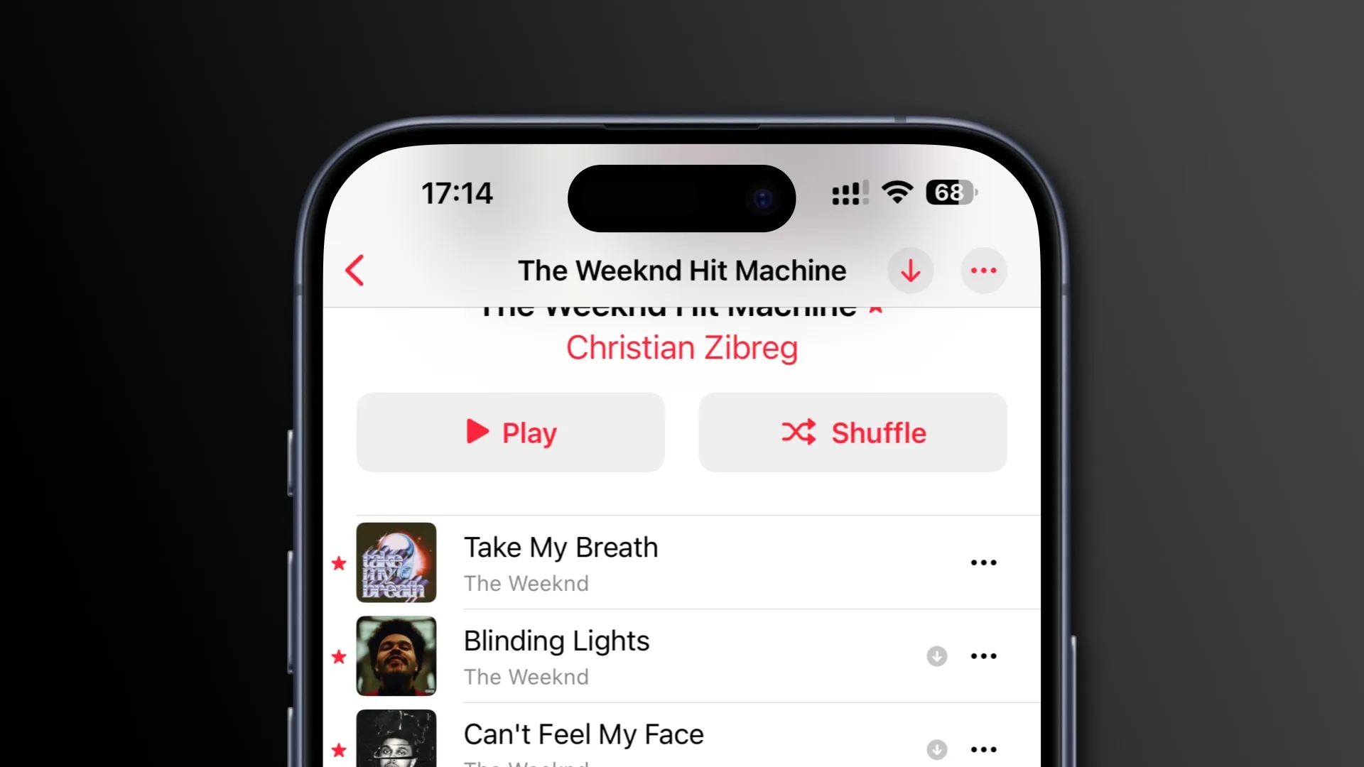 즐겨찾는 노래 옆에 별표 아이콘이 표시된 Apple Music의 트랙 목록