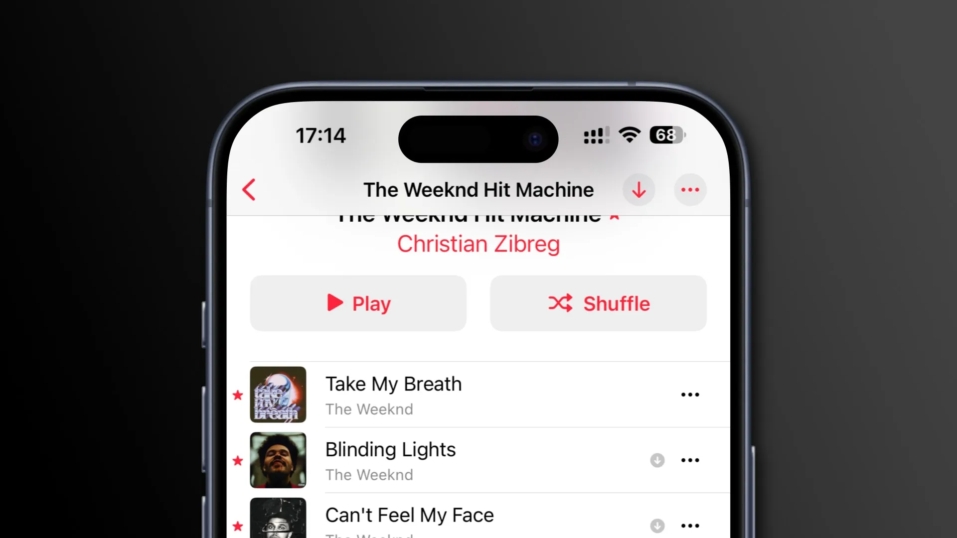 Apple Music 上的曲目列表在喜愛的歌曲旁邊顯示星形圖標