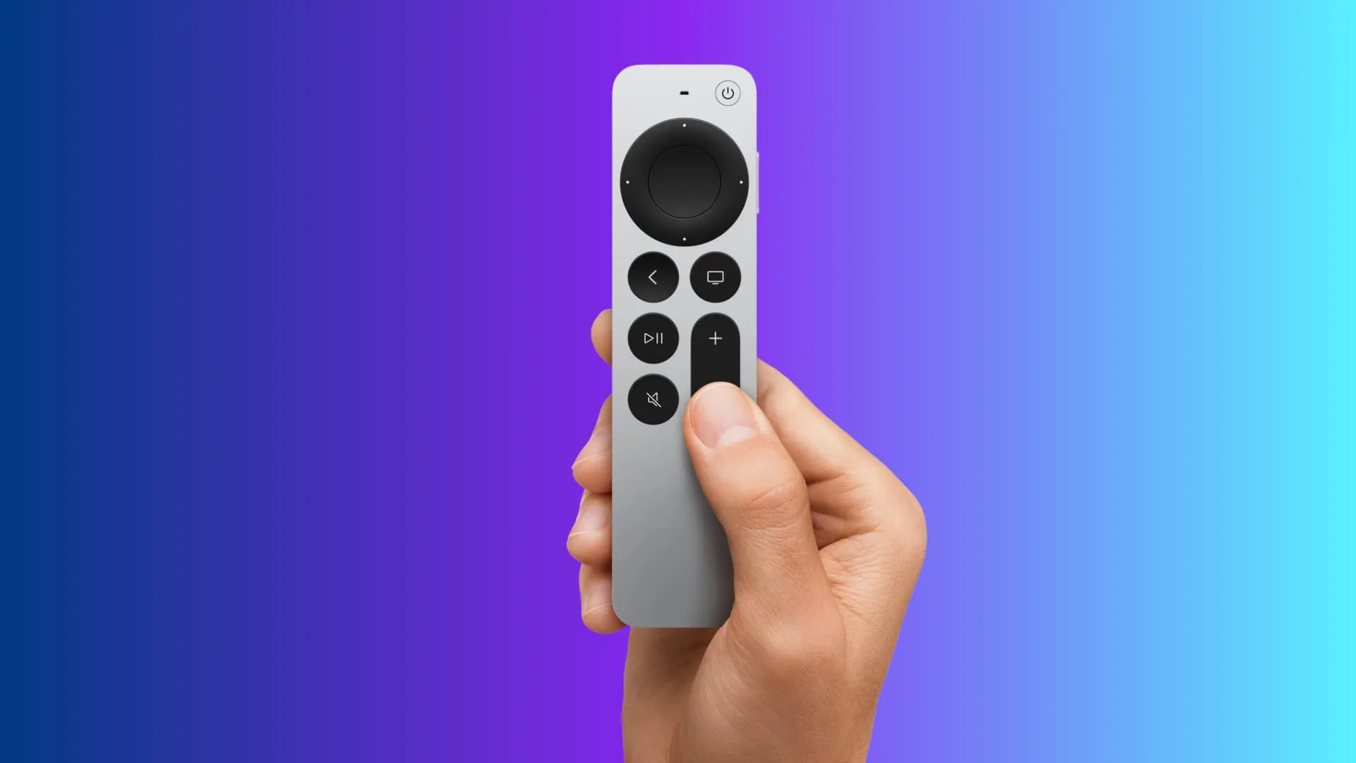 Holding Apple TV Siri Remote