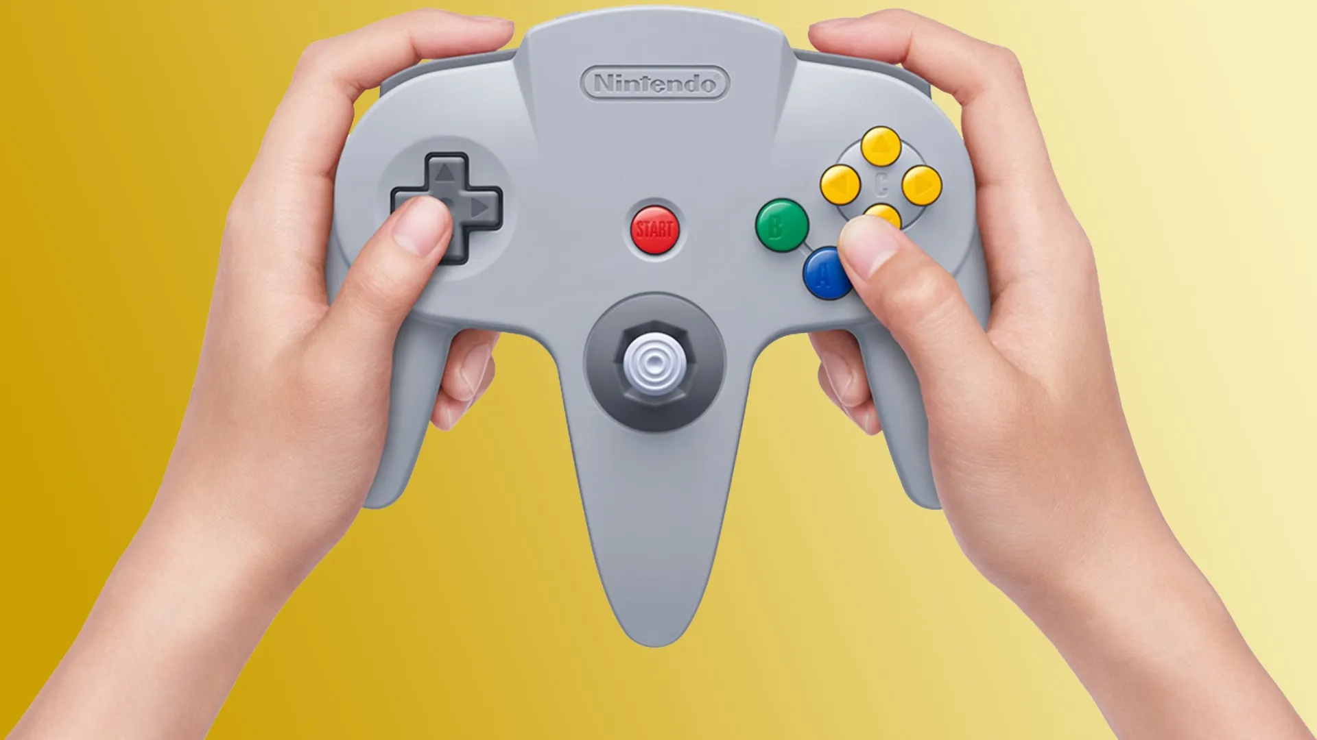 Nintendos überarbeiteter N64-Controller für Switch in Händen gehalten