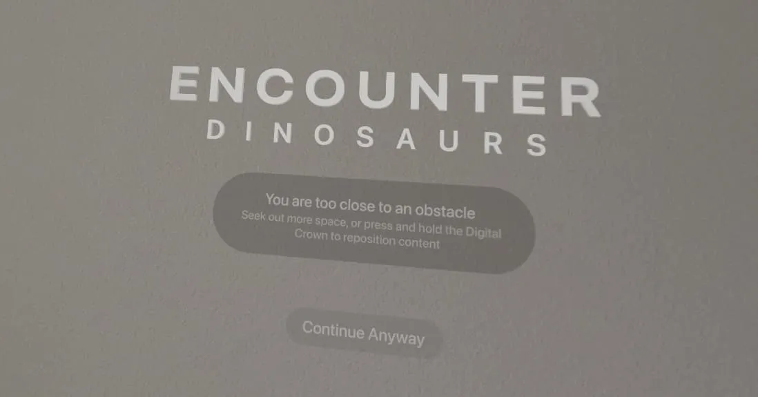 Vous êtes trop près d'un message d'obstacle dans Encounter Dinosaurs sur Vision Pro